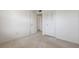 Bright bedroom with carpet, door and closet at 5095 Bay Ne St # 109, St Petersburg, FL 33703