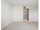 Carpeted bedroom with access to the bathroom at 5095 Bay Ne St # 109, St Petersburg, FL 33703