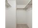 Empty closet with double rods and neutral walls at 5095 Bay Ne St # 109, St Petersburg, FL 33703