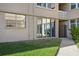 Exterior view showing sliding glass doors and landscaping at 5095 Bay Ne St # 109, St Petersburg, FL 33703