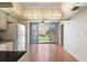 Kitchen with white cabinets and view to patio at 5095 Bay Ne St # 109, St Petersburg, FL 33703