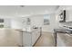 Modern kitchen with granite countertops and island at 3622 Moscato Dr, Brooksville, FL 34602