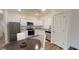 Modern kitchen with stainless steel appliances and granite countertops at 11831 Sylvia St, Dade City, FL 33525