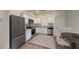 Modern kitchen with stainless steel appliances and granite countertops at 11831 Sylvia St, Dade City, FL 33525