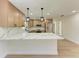 Modern kitchen with light wood cabinets and quartz countertops at 1844 Riviera Cir, Sarasota, FL 34232