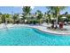 Community pool with plenty of lounge chairs at 16126 Ivy Ridge Ct, Port Charlotte, FL 33953