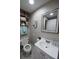 Clean bathroom with vanity, toilet and mirror at 6728 Sea Ranch Dr, Hudson, FL 34667