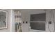 Bathroom with shower stall and window at 6728 Sea Ranch Dr, Hudson, FL 34667