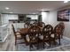 Dining area with a table and chairs, located near the kitchen at 6728 Sea Ranch Dr, Hudson, FL 34667