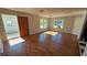 Bright living room with wood-look floors at 3711 Wiggins Leaf St, Tampa, FL 33619