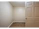 Small bedroom with wood-look floors and a window at 4642 10Th S Ave, St Petersburg, FL 33711