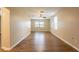 Open living room with wood-look floors and ample natural light at 4642 10Th S Ave, St Petersburg, FL 33711