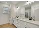 Bathroom with double vanity, quartz countertop, and modern fixtures at 12326 Deep Creek Dr, Spring Hill, FL 34609