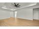 Large living room featuring hardwood floors and high ceilings at 12326 Deep Creek Dr, Spring Hill, FL 34609