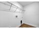 Laundry room with wire shelving and vinyl flooring at 13390 Banyan Rd, Spring Hill, FL 34609