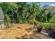 Spacious paved patio perfect for outdoor dining, surrounded by lush landscaping at 5900 98Th N Ave, Pinellas Park, FL 33782
