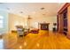 Finished basement with hardwood floors, fireplace, and seating area at 5900 98Th N Ave, Pinellas Park, FL 33782
