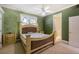 Bedroom with ceiling fan and en-suite bathroom at 5900 98Th N Ave, Pinellas Park, FL 33782