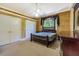 Spacious bedroom with double doors and a large window at 5900 98Th N Ave, Pinellas Park, FL 33782