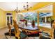 Elegant dining room with ornate furniture and a view of the pool at 5900 98Th N Ave, Pinellas Park, FL 33782