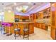 Well-equipped kitchen with wood cabinets and granite counters at 5900 98Th N Ave, Pinellas Park, FL 33782