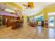 Open concept kitchen and dining area with pool view at 5900 98Th N Ave, Pinellas Park, FL 33782