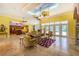 Living Room with high ceilings, ornate furniture and access to pool at 5900 98Th N Ave, Pinellas Park, FL 33782