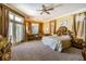 Spacious main bedroom with sitting area and access to patio at 5900 98Th N Ave, Pinellas Park, FL 33782
