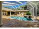 Stunning pool and spa with a covered patio and lush landscaping at 5900 98Th N Ave, Pinellas Park, FL 33782
