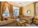 Cozy sitting room with ornate furniture and large windows at 5900 98Th N Ave, Pinellas Park, FL 33782