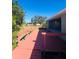 Wooden deck overlooking the backyard with railings at 6336 Florida Cir, Apollo Beach, FL 33572