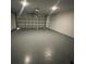 Spacious garage with an open garage door at 6336 Florida Cir, Apollo Beach, FL 33572