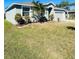 Charming one-story home with well-manicured lawn at 6336 Florida Cir, Apollo Beach, FL 33572