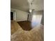 Large living room with tile flooring and ceiling fan at 6336 Florida Cir, Apollo Beach, FL 33572