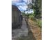 Gated area leading to the back and side of the home at 21300 Washburn Ave, Port Charlotte, FL 33952