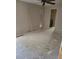 A neutral bedroom with ceiling fan and large window at 21300 Washburn Ave, Port Charlotte, FL 33952