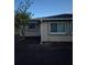 View of home's side exterior featuring newly laid dirt and windows at 21300 Washburn Ave, Port Charlotte, FL 33952