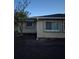 View of home's side exterior featuring newly laid dirt and windows at 21300 Washburn Ave, Port Charlotte, FL 33952