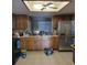 Traditional kitchen with stainless steel appliances and tile floors at 21300 Washburn Ave, Port Charlotte, FL 33952