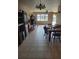 Open-concept living room with tile flooring and natural light at 21300 Washburn Ave, Port Charlotte, FL 33952