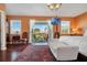 Spacious bedroom with king-size bed and access to a private balcony at 4049 Cobia Dr, Hernando Beach, FL 34607