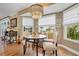Charming breakfast nook with a round table and built-in bench seating at 4049 Cobia Dr, Hernando Beach, FL 34607