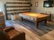 Game room featuring a pool table and extensive beer collection display at 4049 Cobia Dr, Hernando Beach, FL 34607
