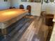 Game room with pool table and comfortable seating area at 4049 Cobia Dr, Hernando Beach, FL 34607