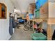 Organized garage with ample storage for bikes and kayaks at 4049 Cobia Dr, Hernando Beach, FL 34607