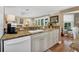 Well-equipped kitchen with granite countertops and custom cabinetry at 4049 Cobia Dr, Hernando Beach, FL 34607