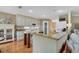 Modern kitchen with granite countertops and white cabinets at 4049 Cobia Dr, Hernando Beach, FL 34607