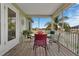 Relaxing screened porch with water views and seating area at 4049 Cobia Dr, Hernando Beach, FL 34607