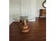 Unique glass-top dining table with horse head base at 15625 State Road 62 St, Parrish, FL 34219