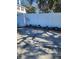 Private driveway with white fence and landscaping at 15625 State Road 62 St, Parrish, FL 34219